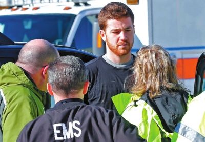 嫌犯接受詢問。新華社/美聯(lián)